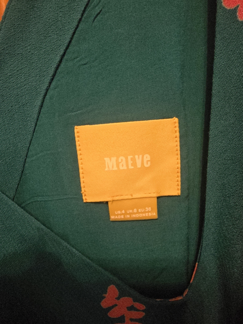 Maeve Forest Green Dress with Orange Label and Red Floral Detail